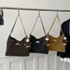 Bolso tote de nicho versátil y minimalista para mujer, nuevo modelo de invierno 2025, textura de alta calidad, adecuado para el trabajo y los desplazamientos, bolso de hombro cruzado