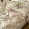 Juego de cuatro piezas floral 100% algodón Clase A, ropa de cama de algodón lavado, funda de edredón de encaje estilo coreano, funda de edredón y sábana de algodón puro