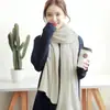 Bufanda de mujer otoño e invierno popular en Corea del Sur color liso cachemira punto lana bufanda hombres y mujeres todo a juego venta al por mayor de fábrica