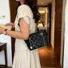 Bolso de mano de cadena de rombos de moda, bolso tipo cubo para mujer, nuevo estilo Otoño 2026, simple, versátil, de lujo ligero, bolso de hombro cruzado