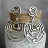 Pendientes colgantes con diseño hueco en espiral bohemio vintage de Mingcheng, regalo sencillo de moda para mujer, venta al por mayor