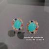 Anel de esmeralda de pavão brilhante banhado a ouro 18K Oito corações e oito flechas Zircon Emerald Flower Full Diamond Ring Earrings