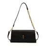 Bolso vintage transfronterizo para mujer 2026 otoño e invierno nuevo bolso baguette, bolso de hombro de diseño nicho de alta gama, bolso bandolera con cadena