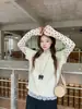 2026 Otoño Temprano Conjunto Coreano Súper Atractivo Conjunto Completo Cardigan de Punto Manga Corta Superpuesto con Prenda Base Conjunto de Dos Piezas