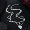 Collar para hombre con colgante de estrella en forma de corazón, un accesorio de hip-hop moderno y versátil, una pieza de joyería de moda y lujosa para mujeres