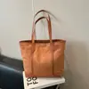 Bolso de Mano Grande de Textura para Estudiantes Viajeras para Mujer 2025 Otoño e Invierno Nuevo Bolso Tote de Hombro Casual Elegante de Nicho