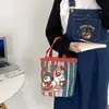 Bolsa de almuerzo zoo de tomate bolsa cubo linda cooperación de pintor dibujos animados estudiante portátil cilindro bolsa de lona