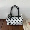 Bolso de mujer de gran capacidad 2026 nuevo diseño de moda con lunares, bolso tote para el trabajo y los desplazamientos, bolso de hombro casual elegante y único