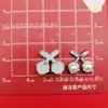 Accesorios Plásticos DIY Coloridos Pequeños Estilo Chanel Gato Flor Fresa Corbata de Moño Cereza Accesorios para Celular Pasador Hebilla de Zapato Materiales