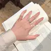 Joyería de cristal blanco de diseño único, citrino natural, anillo de racimo de flores de circón brillante mariposa, lujo ligero y sensación de alta gama