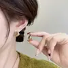 Moda Coreana Latón Chapado en Oro Real Personalidad Nicho Retro Estilo Ins Bolsa de Cuerno Aretes Elegantes Versátiles Pendientes