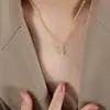 Hip Hop Europeo y Americano Nuevo Colgante de las Doce Constelaciones Aries León Colgante de Pedrería Collar Acero de Titanio Chapado en Oro Verdadero 18K