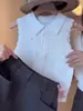 Top de punto blanco estilo francés, suave y cómodo, con cuello polo, para mujer, Verano 2026, Blusa sin mangas abotonada y transpirable