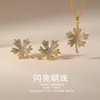 Juego de Collar y Aretes Cobre Perla Brillante Chapado en Oro Cobre No Decolorable Lujo Ligero de Alta Gama Joyería al por Mayor Transfronteriza para Mujer