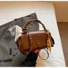 Bolso de Mano de Alta Gama de Nicho para Mujer 2026 Nuevo Moda Retro Bolso Cuadrado Pequeño Bolso Cruzado de Hombro Individual para Comercio Exterior Transfronterizo