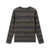 Camiseta de manga larga con estampado de rayas minimalista estilo europeo para mujer, otoño/invierno, detalles plateados, cuello redondo, top moderno, versátil y favorecedor