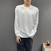 Camiseta casual versátil de jacquard simple, cuello redondo, manga larga, color liso, corte holgado, capa base, top texturizado adelgazante