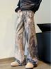 Nuevos pantalones vaqueros de pierna ancha de cintura baja con estampado de tinta salpicada de camuflaje digital 3D para hombre y mujer con una generación de algodón