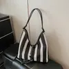 Bolsa de Mão Feminina 2026 Nova Moda Listrada Bolsa Tote de Ombro Casual Trançada Nicho para o Dia a Dia Tendência