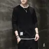 Primavera 2025 nueva camiseta de manga larga juvenil coreana para hombre, camiseta interior cuello redondo holgada tendencia ropa al por mayor para hombre