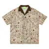 Camisa de Algodón y Lino Hawaiano con Rayas Verticales Originales y Tótem Antiguo, Estilo Vacacional, Artística y Fresca, Top Retro 2026