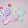 Peine mini de cojín de aire de color caramelo portátil para masaje portátil peine de bolsa de aire con pegamento en crema para niños niña pequeña peine lindo