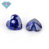 Huagang gema agujero único medio en forma de corazón circón azul Tan sang piedra desnuda al por mayor gema sintética artificial Tan Sang Lan