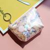 Linda celebridad de internet japonesa ins bolsa de cosméticos de gran capacidad con arena movediza de planeta corazón de niña portátil tamaño pequeño bolsa de aseo de viaje