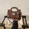 2026 Nuevo Bolso de Mano con Asa de Cadena Tejida de Lujo, Bolso de Hombro Cruzado de Gama Alta de Nicho para Mujer
