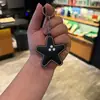 Llavero Creativo de Piel Sintética con Forma de Estrella Colgante para Bolso Regalo Exquisito para Parejas Llavero de Coche Venta al por Mayor