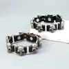 Pulseira de PU com Rebite de Caveira Simples Estilo Punk para Homens Pulseira de Pulso para Motociclista Acessórios de Couro com Personalidade Atacado Transfronteiriço