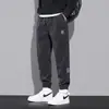 Calça Casual da Moda de Marca Pesada para Homens Outono e Inverno Calças de Perna Larga com Forro de Lã Engrossadas Quentes Moda Calças Esportivas