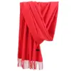 Bufanda de cachemira sintética para mujer versión coreana de otoño e invierno cálida color liso reunión anual bufanda de cachemira roja chal con flecos venta al por mayor de fábrica