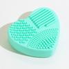 Limpiador de brochas de maquillaje con forma de corazón de silicona, directo de fábrica, herramienta de maquillaje de belleza, almohadilla de limpieza para fregar manchas
