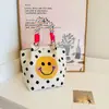 Nuevo bolso de mano portátil estilo japonés y coreano para ir al trabajo en la temporada de floración de los cerezos, bolsa de punto de gran capacidad, bolso tote cuadrado pequeño