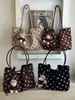 Bolso tote de lino de alta gama de nicho con lunares, nuevo modelo 2026, versátil para ir al trabajo, bolso de hombro y axila de gran capacidad