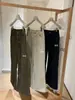 Wgwe8257 Ropa de Mujer Guangzhou Shisanxing Otoño/Invierno Nuevo Pantalones de Pana de Cintura Alta con Bolsillo Trasero Pantalones Casuales Pantalones Largos de Moda