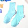 Venta directa de fábrica de calcetines de primavera con explosiones de colores sólidos japoneses de color caramelo para mujer, calcetines de colores de marea, venta al por mayor