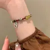 Librito Rojo Nuevo pulsera de cuentas de la suerte para mujer lujo ligero nicho diseño de personalidad nuevo retro chino