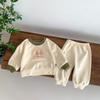 Ropa de otoño para bebé, estilo coreano, suéter de manga larga con estampado de gato de dibujos animados, pantalones, traje deportivo de dos piezas para hombre y mujer.