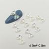 Joyería de uñas Aurora flor lazo uñas Diamante Oso lazo cinta pajarita uñas conjunto de diamantes decorativos Venta al por mayor