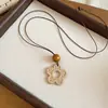 Collar colgante de resina y ratán transfronterizo europeo y americano, cadena para la clavícula de diseño nicho, estilo vintage, accesorio para mujer inspirado en las vacaciones