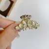 Acessórios de Cabelo de Celebridade da Internet Franja Presilha Presilha Superior Coreia do Sul Feminino Simples Elegante Alto Padrão Pedra Olho de Gato Borboleta tamanho pequeno Presilhas de Encaixe