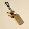 Cadena de llaves para coche con colgante de campana de madera de melocotón dorada con marca de sándalo creativo, se puede grabar, seguro y sólido, marca, colgante de marea nacional