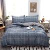 Ropa de cama textil para el hogar algodón aloe vera funda de edredón individual al por mayor funda de edredón individual doble juego de cuatro piezas estilo nórdico dormitorio estudiantil