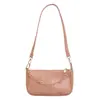 Bolsa de mão, bolsa transversal de nicho, bolsa de ombro, bolsa baguette em couro legítimo, bolsa versátil de alta costura para mulheres
