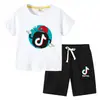 Camiseta Infantil 2026 Tiktok Verão Novo Comércio Exterior Roupas Infantis Estilo Coreano Conjunto de Duas Peças Manga Curta e Shorts para Crianças