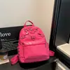 Mochila moderna, estilosa, simples e de grande capacidade para trabalho e deslocamento, com uma cor sólida única e design descontraído, pode ser carregada como uma bolsa de mão ou mochila