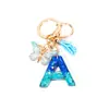 Llavero de Lentejuelas con Gradiente Azul-Verde y Letra, Borla de Mariposa Incrustada con Diamantes, Encanto para Bolso con Letra Inicial Personalizable para Bricolaje