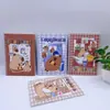 Novo Caderno de Bobina Cartoon 25k com Papel Metalizado Portátil para Estudante Alto Valor de Cor Caderno A5 Virar